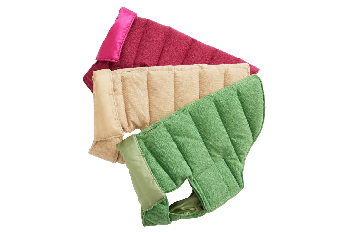 Three dog puffer coats in cranberry red, oatmeal beige, and apple-green colors, displayed in a stacked arrangement.